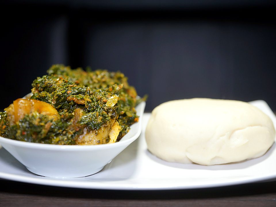 A bowl of Ofe Owerri, rich with greens, stockfish and assorted meat